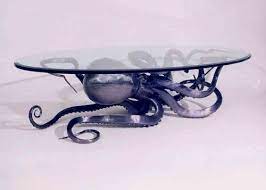 Finally finished my mosaic octopus coffee table. Put A Tentacle On It 7 Octopodes You Need In Your Home Offbeat Home Life Octopus Decor Decor Home Decor