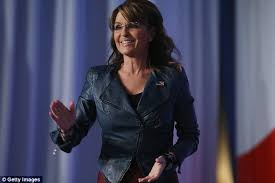 Résultat de recherche d'images pour "sarah palin child stands on dog"