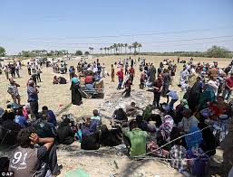 Image result for iraq exedus displacement carnage civilians mothers dea children