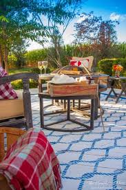 Burnish the tape with a putty knife. Painted Diy Outdoor Rug Tutorial The Heathered Nest