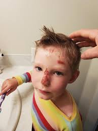 Kid riding honda 400ex dirtbike