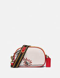 Coach x keith haring bag charm f28598 glitter leather ice blue pink blacktop rated seller. Coach Disney Mickey Mouse X Keith Haring Badge Kamera Umhangetasche