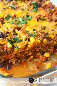 Beef Tortilla Casserole Made With Ground Beef Mexican Spices And Beans All Layered Between Mexican Casserole Recipe Tortilla Casserole Easy Casserole Recipes