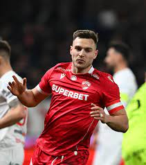 Merita mai devreme”. Mesajul lui Dinamo și reacția lui Dennis Politic, după  convocarea la națională » Primul „câine” după 3 ani! - GOLAZO.ro