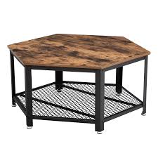 Marrying the design aesthetics of industrial machinery and rustic cabin styles this table features a weathered wooden top smooth matte black steel body and a sturdy solid standing base. Vasagle Industrial Coffee Table Hexagonal Wooden Table Stable Metal Frame And Mesh Shelf Rustic Brown Buy Online In Antigua And Barbuda At Antigua Desertcart Com Productid 93950757