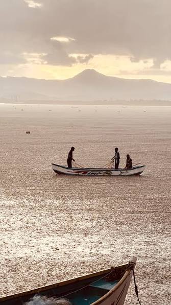 Fishing boats lie anchored along the Arabian Sea coast at Uttan Beach on the outskirts of Mumbai, Sunday, June 14, 2026, as the annual fishing season draws to a close ahead of