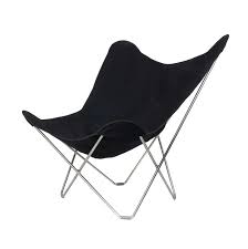 Period midcentury butterfly chair, having a wrought iron frame and original black canvas sling seat. Indoor Canvas Butterfly Chair Canvas Mariposa Cuero Design
