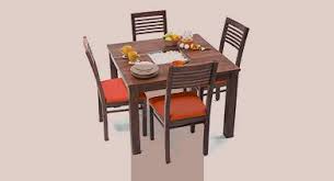 Seasonal table setting with decorative pumpkin. Dining Tables Upto 20 Off Buy Wooden Dining Table Sets Online Urban Ladder