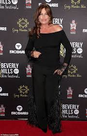 In the movie's opening scenes, a couple of bright guys write a program with their specifications for a perfect woman. Kelly Lebrock Flaunts Her Famous Pout As Weird Science Star Makes Rare Red Carpet Appearance In La Daily Mail Online