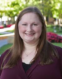 Dr. Jennifer Lynde and Dr. Nathan Droz present research posters at the  annual DAGMEC Resident Research Forum