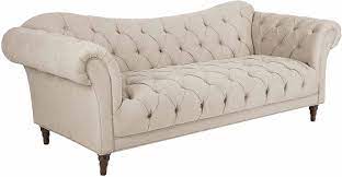 Sie sind zu erkennen an den geschwungenen armlehnen und der edlen punktsteppung. Amazon Com Homelegance St 92 Claire Fabric Chesterfield Sofa Almond Brown Furniture Decor