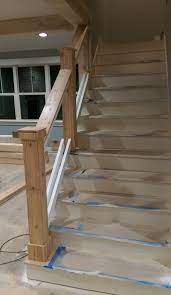 Stairway Newel Posts And Railing Next Step Will Be To Install Mountain Laurel Pickets Stairs Stair Railing Design Stair Railing