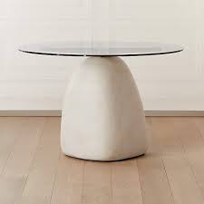 The legs of the table base feature several matte black spokes with a satin brushed brass ring towards the top and bottom of the base. Stone Ivory Round Dining Table 47 Reviews Cb2