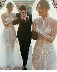 A long scalloped sleeve dress with. Ø¨Ø°Ø±Ø© Ø­Ù…ÙŠÙ… Ø§Ø°Ù‡Ø¨ Ù„Ù„Ø£Ø¹Ù„Ù‰ Priyanka Chopra Ralph Lauren Wedding Dress Price Musichallnewport Com