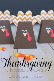 Here, a table runner and a bit of white paint create a place mat that'll have everyone talking. 15 Thanksgiving Place Card Ideas The Happy Scraps