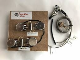 Gibson style (three on a side). Les Paul Upgrade Wiring Kit Short Shaft Potentiometers