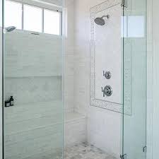 Our classic white 2″ x 8″ in marshmallow is the perfect addition to this bathroom. Herringbone Subway Tile Shower Design Ideas