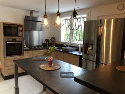 Decouvrez La Cuisine En U Sur Mesure De Veronique L Une Cuisine Bois Et Marron Industriel Realisee Par Cuisinella Cuisinella Cuisine Bois Veranda Cuisine