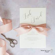 This holiday season the coolest do it yourself wedding invites types take their own cue in the world all around us. Elegant Bow Wedding Invitations Imagine Diy