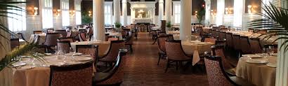 Beautifully restored in the victorian mode, the room is dominated by ionic columns and gleaming white woodwork. Grand Dining Room Jekyll Island Ga Design For Home