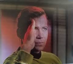 What was the secret message that Captain Kirk whispered to Uhura at the end  of the first episode of Star Trek (TOS)? There is no whisper from Kirk to  Uhura in the