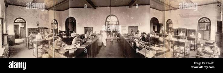 A historical photograph from November 1898 showing the news composing room at The Times of India office in Bombay, illustrating early newspaper production methods Stock Photo - Alamy