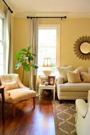 House Crashing Cozy Full Of Character Young House Love Yellow Walls Living Room Yellow Living Room Classy Living Room