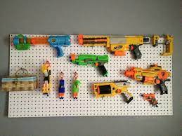 I put an over the door shoe rack on his door to put the nerf guns in! Pin On Boy Stuff