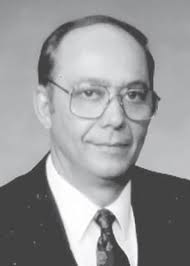 RAYMOND E. KRUEGER