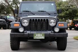 Image result for Brilliant Black 2002 Jeep