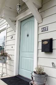 Grey house with blue door. New Door Color Wythe Blue The Wicker House