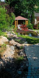 Landhausgarten Mit Natursteinmauern Und Fischteich Garten Fischteich Naturnaher Garten
