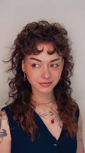 long curly/wavy mullet for Hannah 🍓, cut with my razor! obsessed with the  lil heart shape her bang curls make 🥹 diffused with @hairstorystudio for  touchable but defined curls ✨, link in my bio to book ...