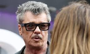 INXS lead guitarist sues rental boat operator over finger severed