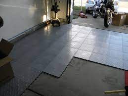 8 Easy And Affordable Garage Floor Options Flooringideasforgarage Rubber Floor Tiles Rubber Garage Flooring Garage Floor