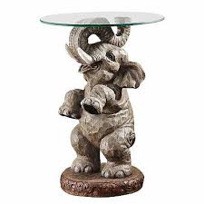 Realistically Hand Painted And Cast In Quality Designer Resin Our Elephant Statue Lends A Sense Of Adventure Glass Top Side Table Elephant Table African Decor