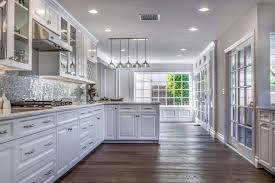 High end white home kitchen. Tarzana White Kitchen Cabinetry Eden Builders