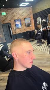 Mid Skin Fade Haircut at Head Quaarters