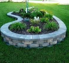 The front yard is the place most homeowners fix first—and for good reason. An Idea For A Retaining Wall Around Front Yard Tree For Front Yard Landscape Designing Jardines Decoraciones De Jardin Ideas De Jardineria