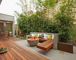 10 garden ideas to steal from provincetown on cape cod. Terraces Ideas Garden Bamboo Plants Sight Protection Concrete Wood Bench Table Garden Design Ideas In 2021 Bamboo Garden Backyard Bamboo Plants