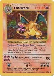 The most obvious way is to look to the right of the pokemon's artwork. Amazon Com Charizard 4 102 Basic Pokemon Card Base Shadowless Holo Toys Games