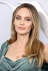 Angelina Jolie & 16-Year-Old Daughter Vivienne Have Matching Stay Gold  Tattoos — See Photos | Teen Vogue