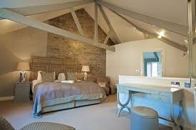 This farmhouse master bedroom pulls it off by pairing a sliding barn door and weathered bench with sleeker furnishings, like a midcentury modern pendant light. The Farmhouse Master Bedroom Picture Of Hillfield Village Dartmouth Tripadvisor