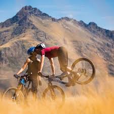Popping A Front Wheelie Standing Still And Giving A Kiss Now Thats Skills Maybe Someday I Ll Be This Talente Mountain Bike Accessories Bike Ride Bike Couple