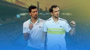 Serbia's novak djokovic (r) and russia's daniil medvedev pose for pictures prior to their men's singles final match on day fourteen of the australian open tennis tournament in melbourne on. Hvd5s7fwg Fsim