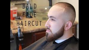 The bald head does all the magic for this style because the beard is untouched. Bald Fade Haircut With Beard Skin Fade How To Shape A Beard Youtube