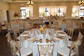 Beautifully Elegant Wedding Table Ivory Table Cloths With A Gold Overlay And Gold Chaivary Chairs Wedding Table 50th Wedding Anniversary Reception Decorations