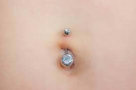 This Is What Happens To Belly Button Piercings During Pregnancy | Allure
