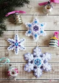 Felt Snowflake Ornaments Made With A Kit From Bucilla Felt Christmas Ornaments How To Make Ornaments Christmas Sewing Projects