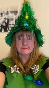 Spray painting in the rain with a Christmas tree